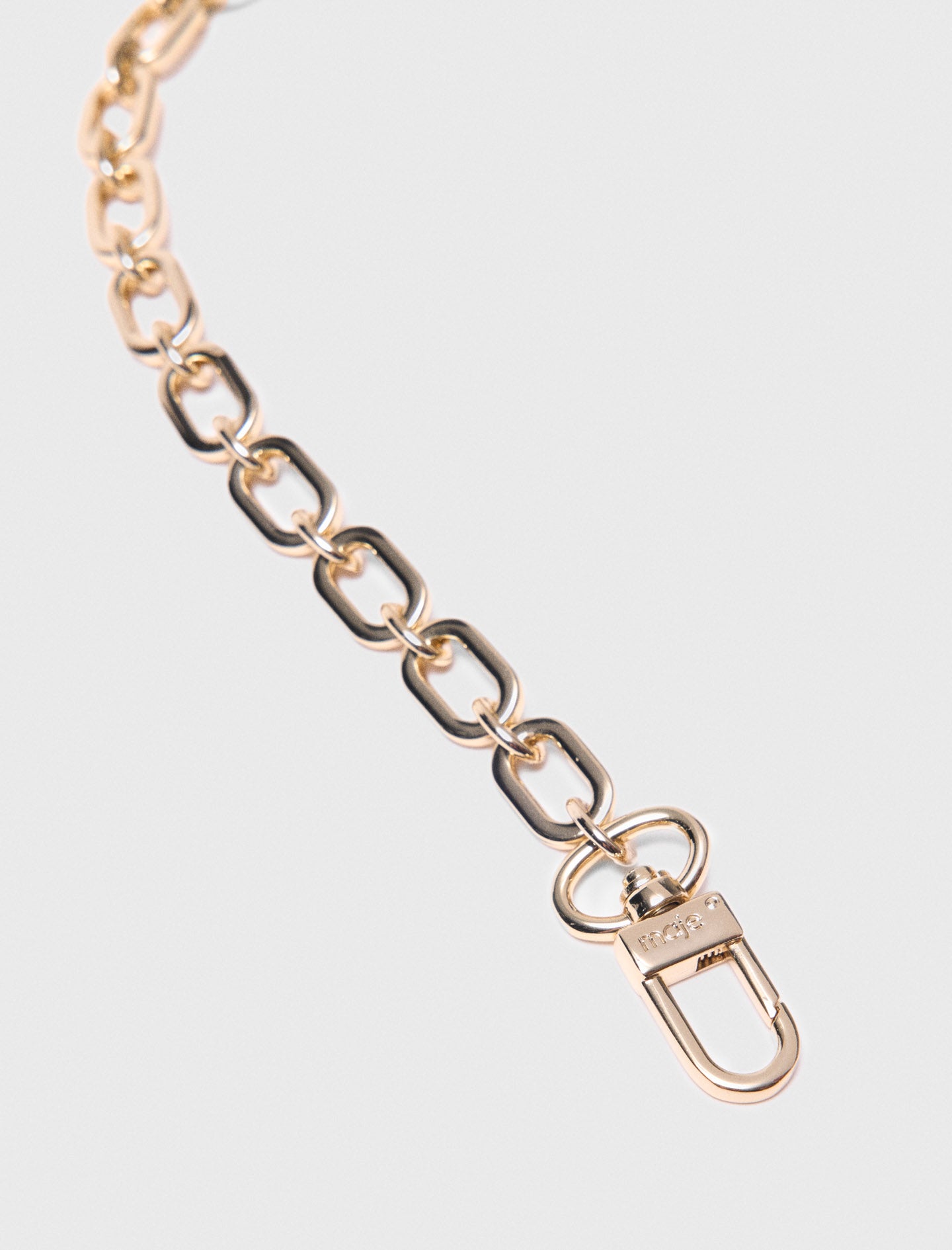 Short chain shoulder strap Gold