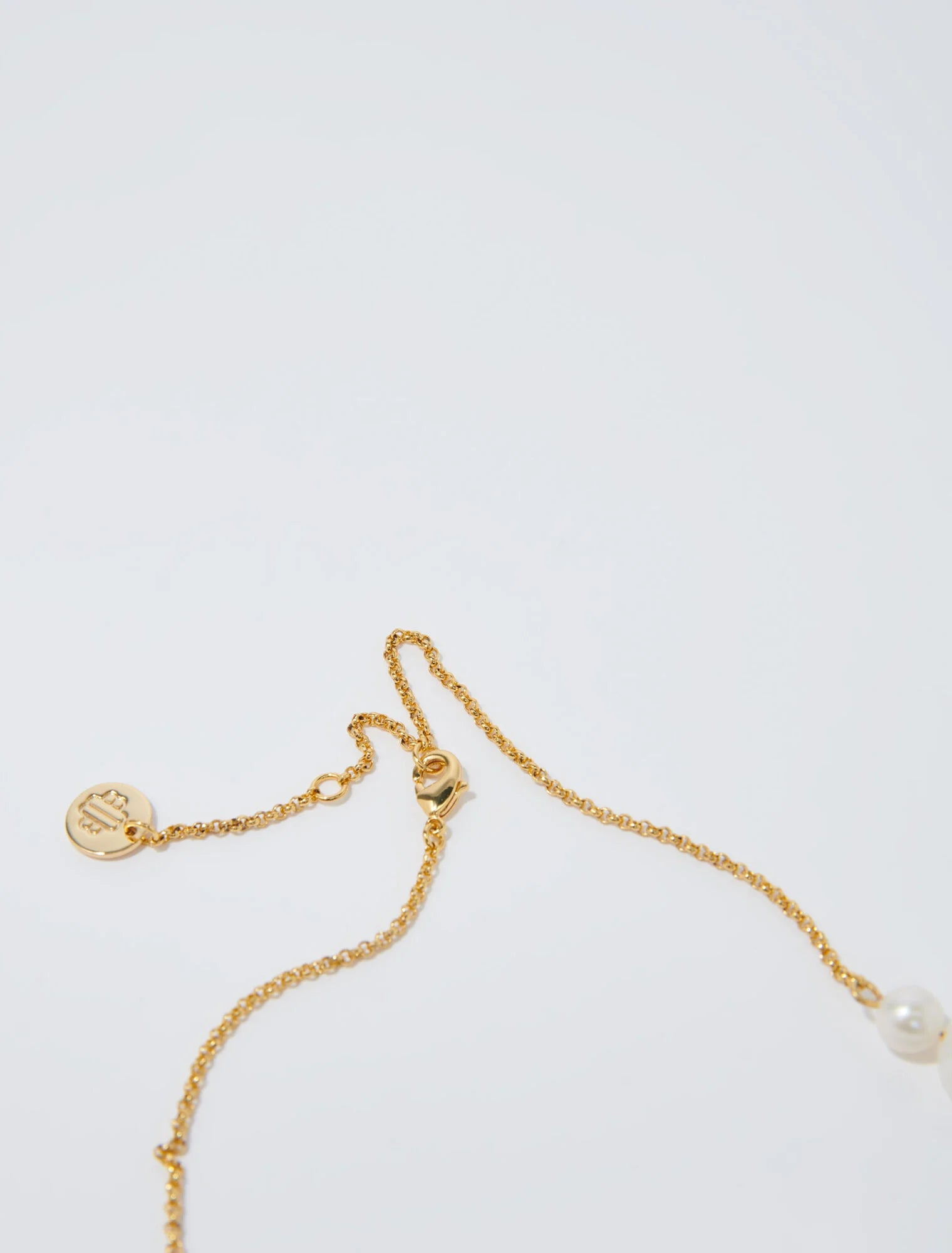 Gold-Gold chain and bead necklace