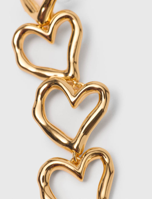 Asymmetric heart earrings