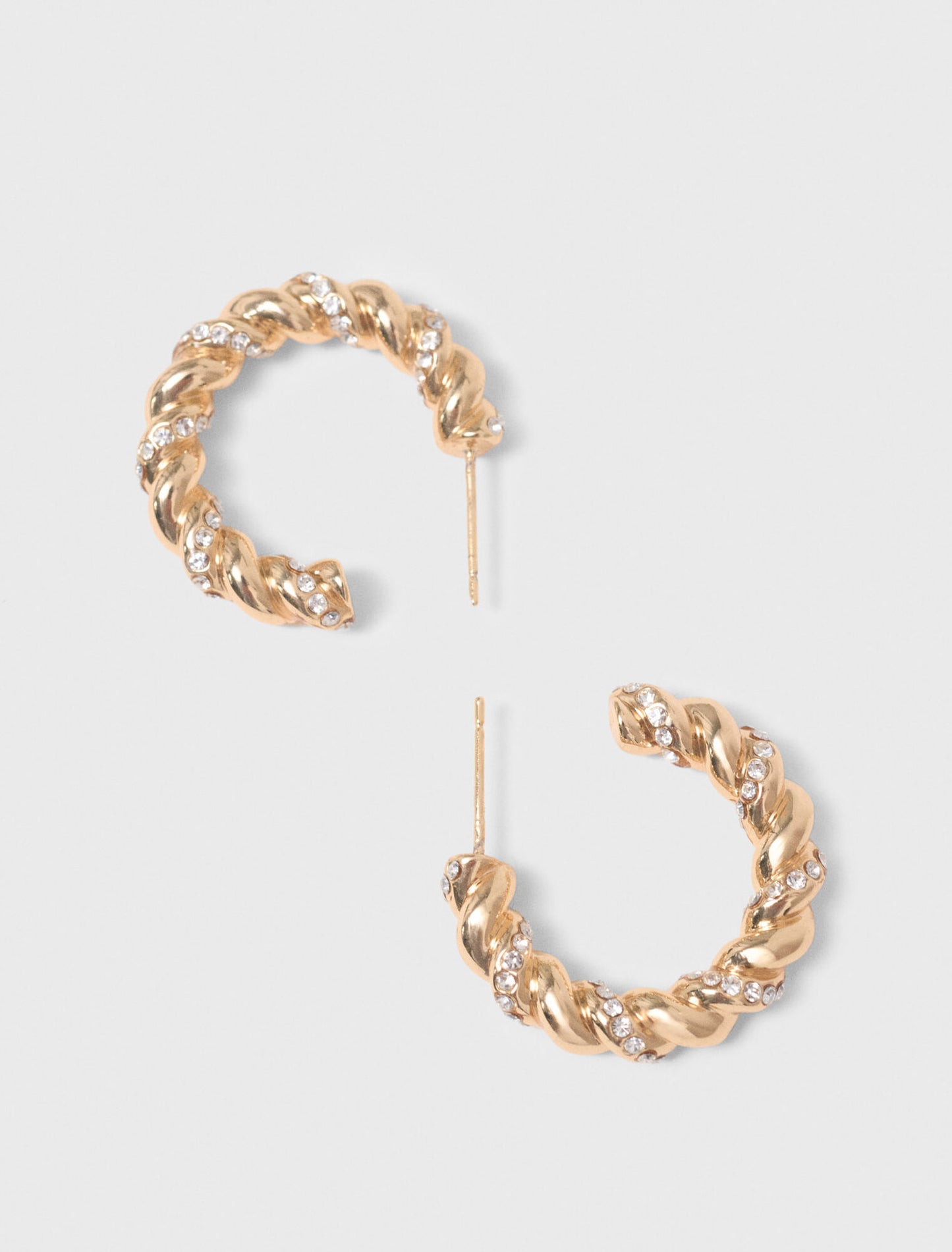 Twisted rhinestone hoop earrings Gold