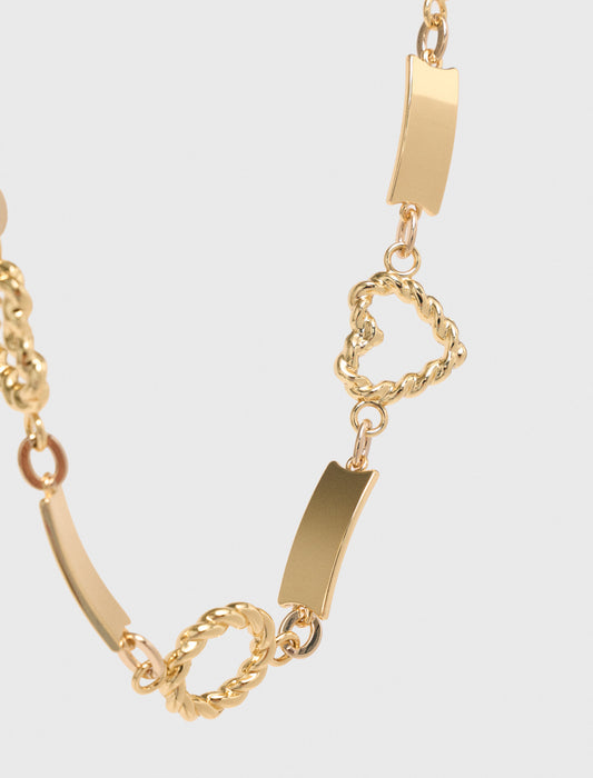 Twisted gold chain belt Gold