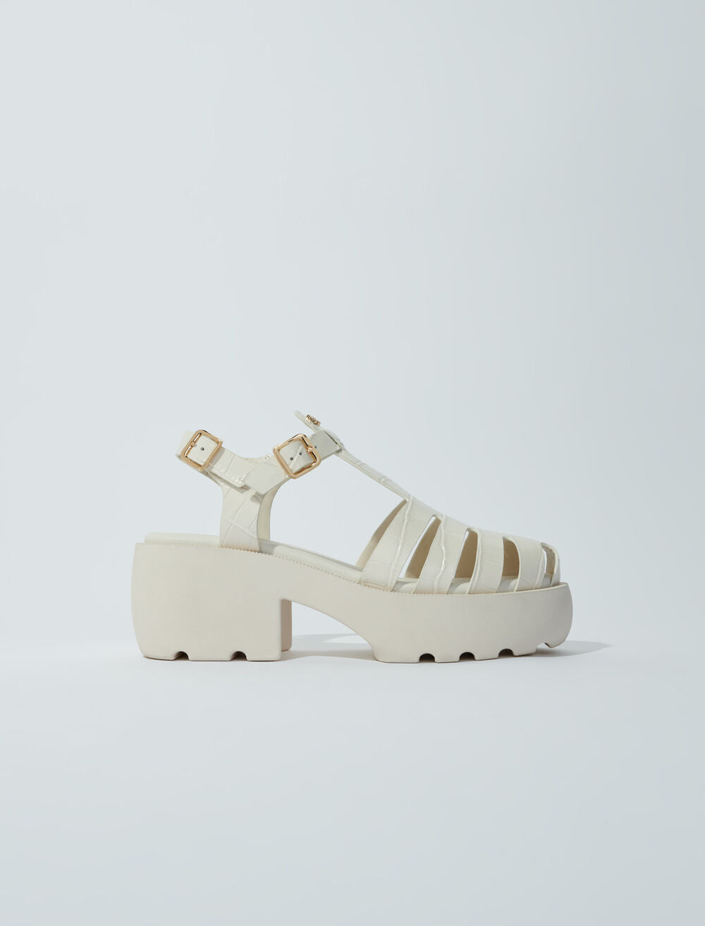 Ecru-featured-Leather sandals with tread
