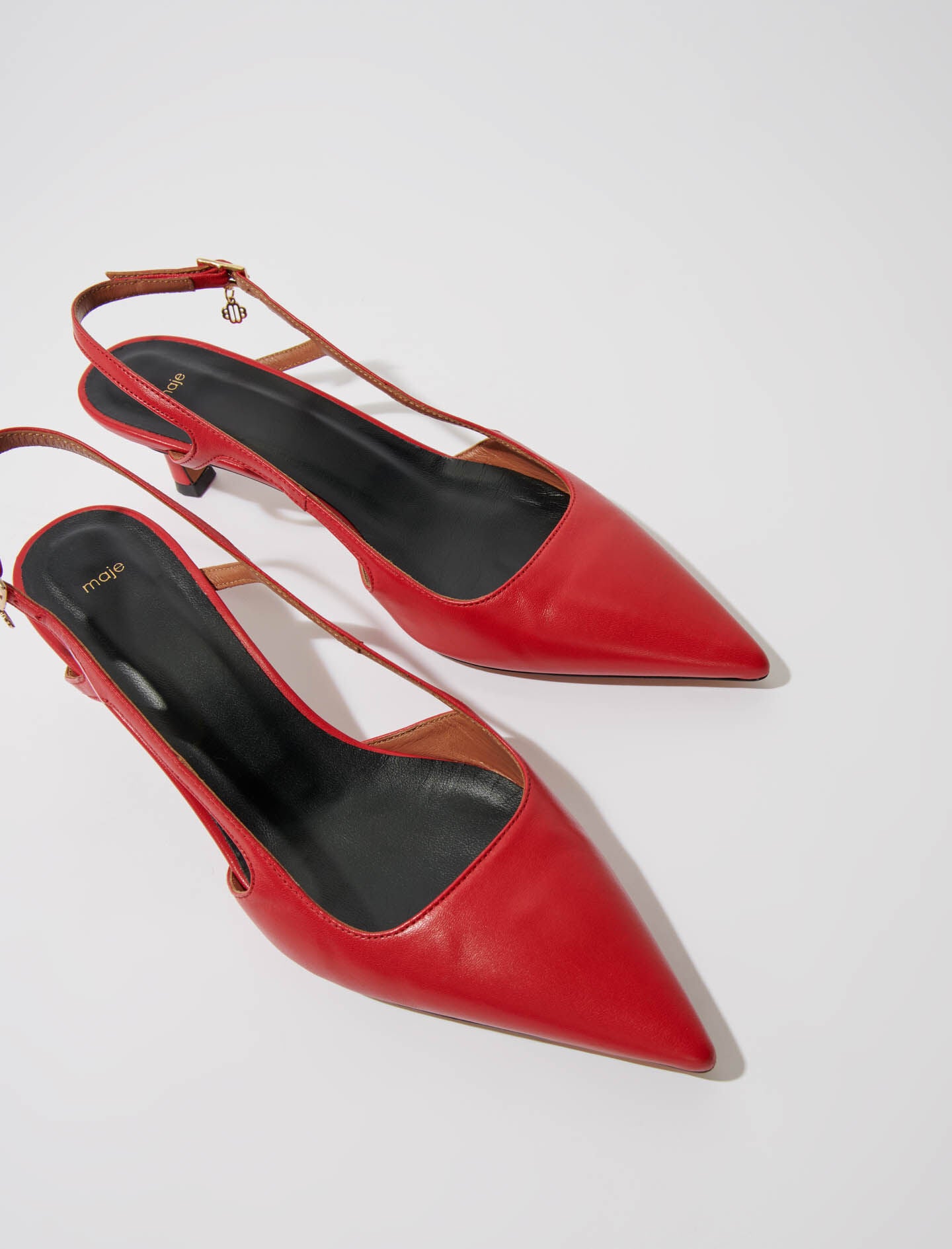 Red-leather court shoes