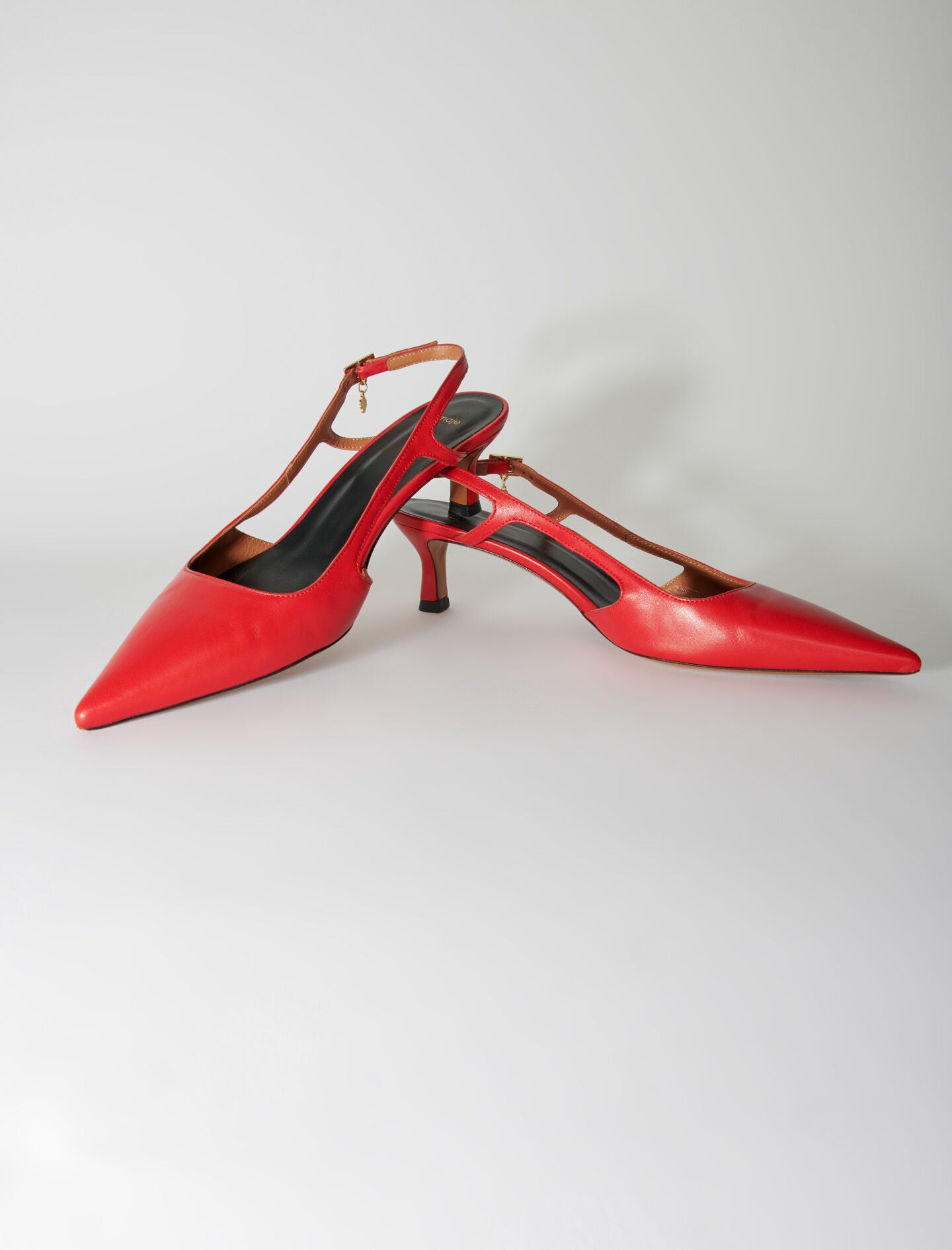 Red-leather court shoes