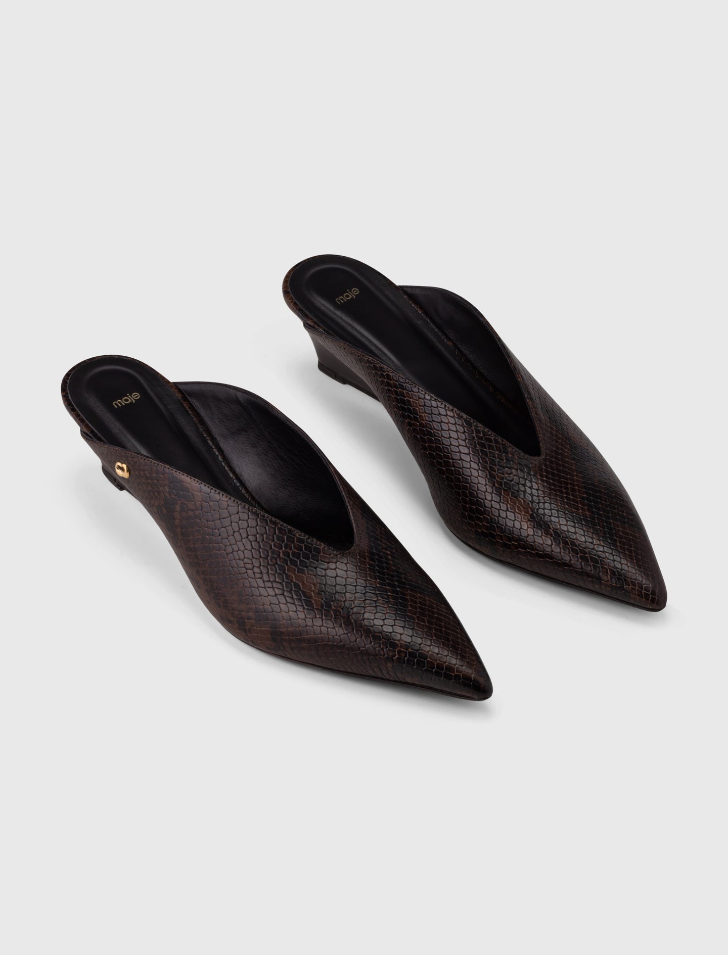 Embossed leather wedge mules Brown Snake Print