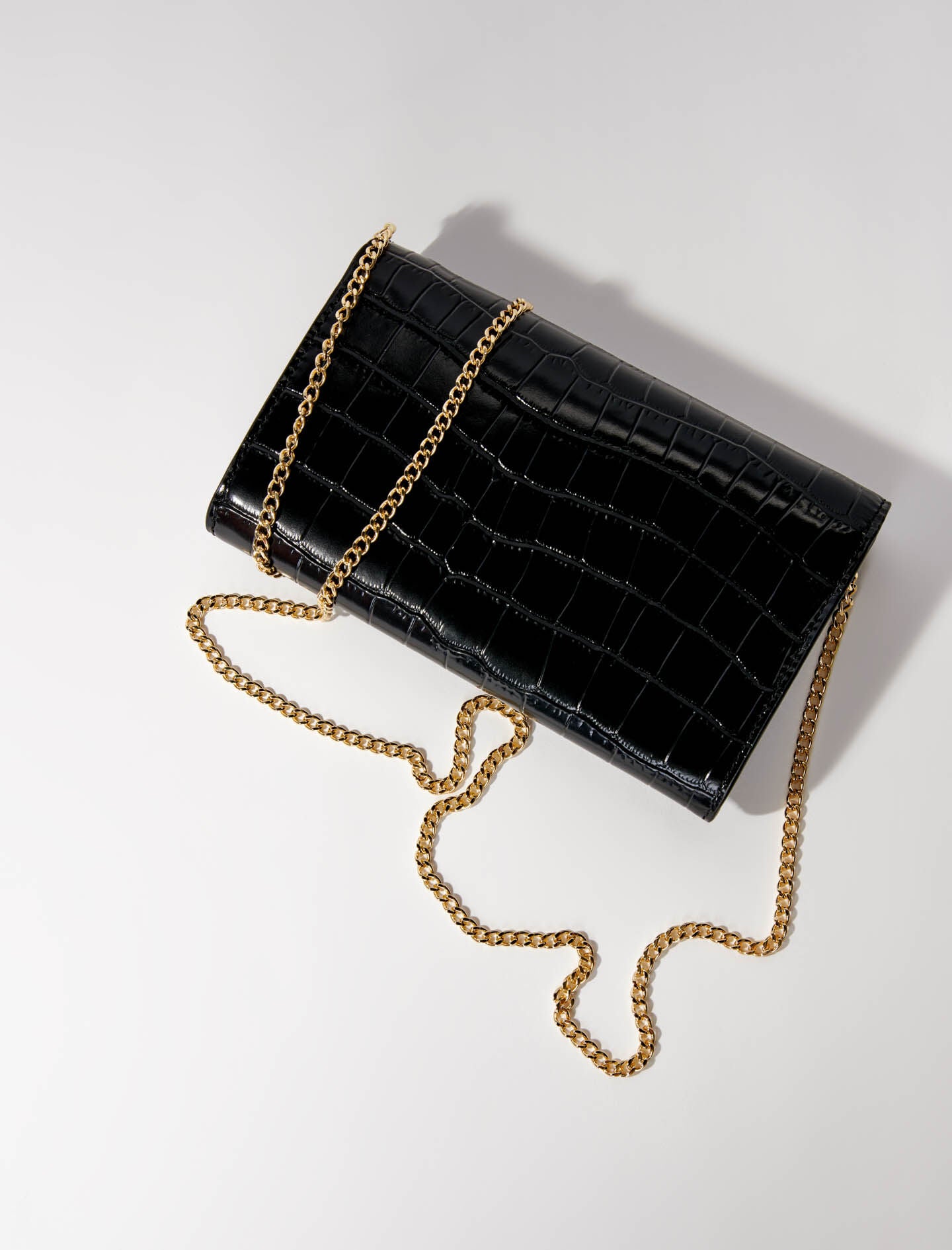 Black-croc-effect embossed leather bag