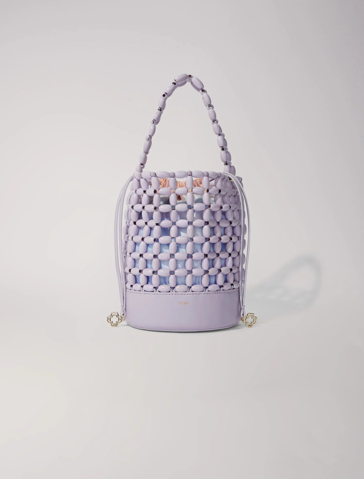 Bucket bag embellished with beads