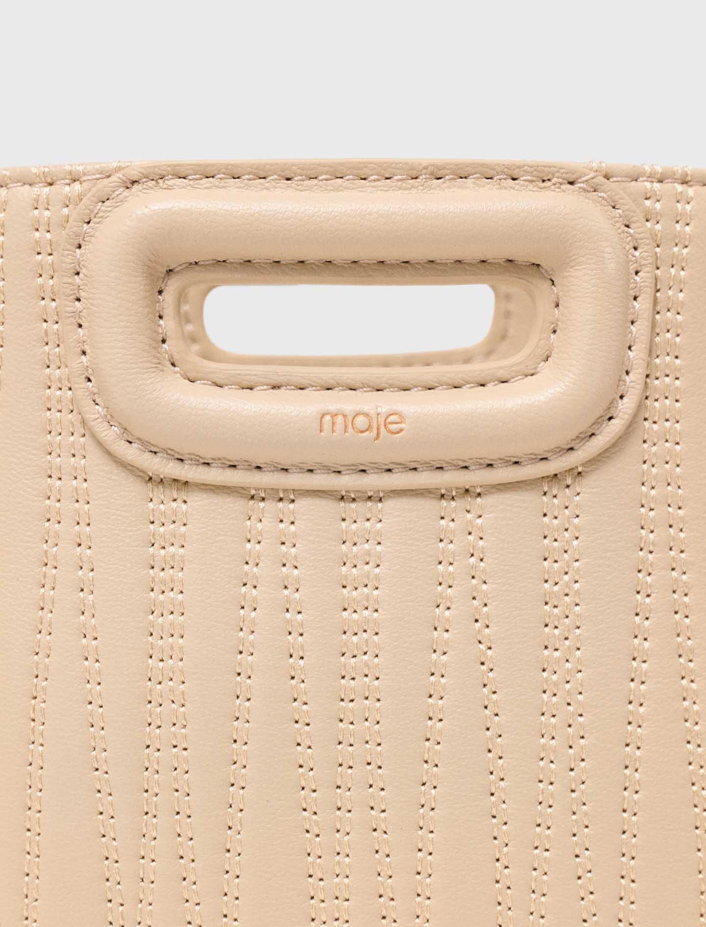 Topstitched leather mini M bag Cream