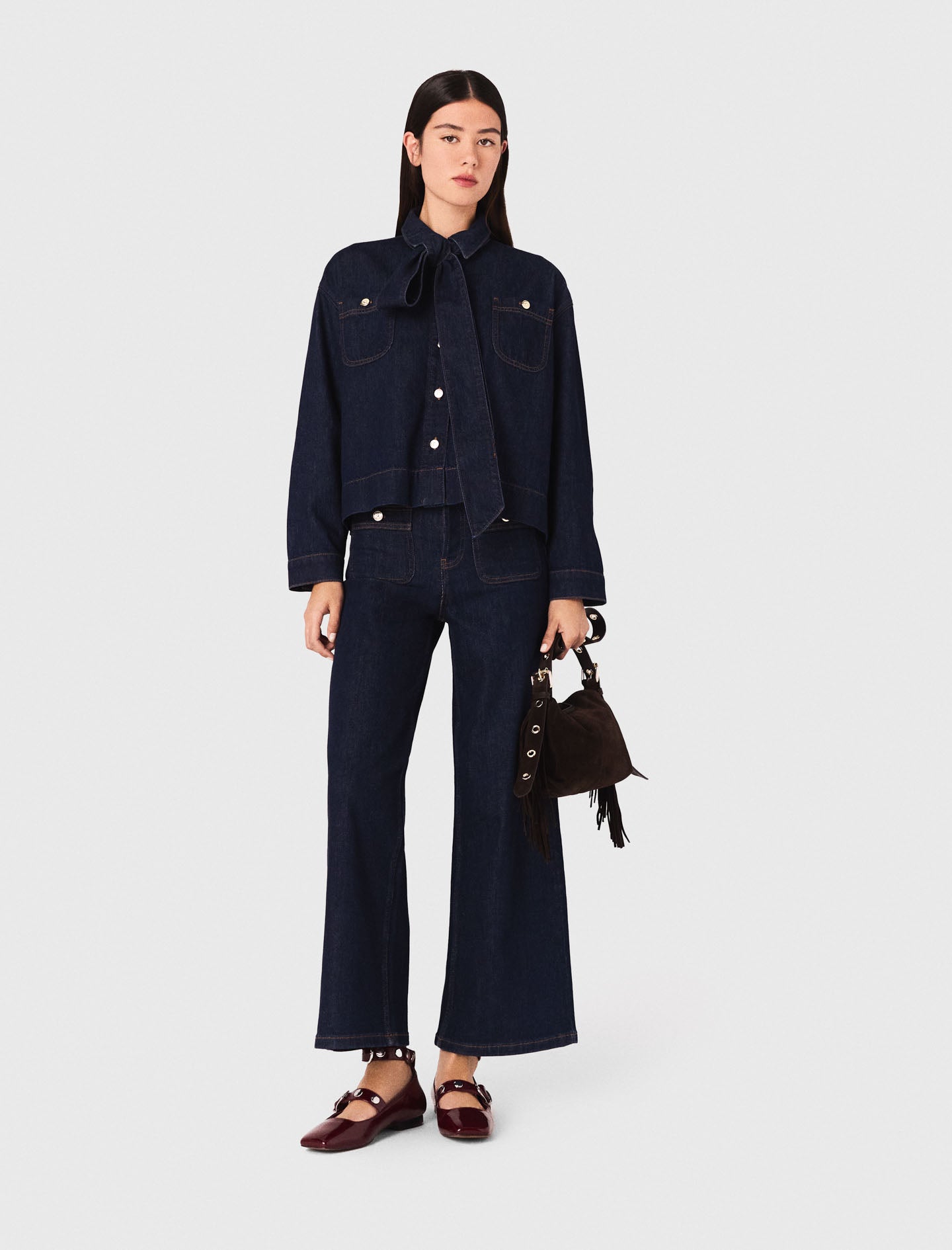 Denim shirt with pussy bow