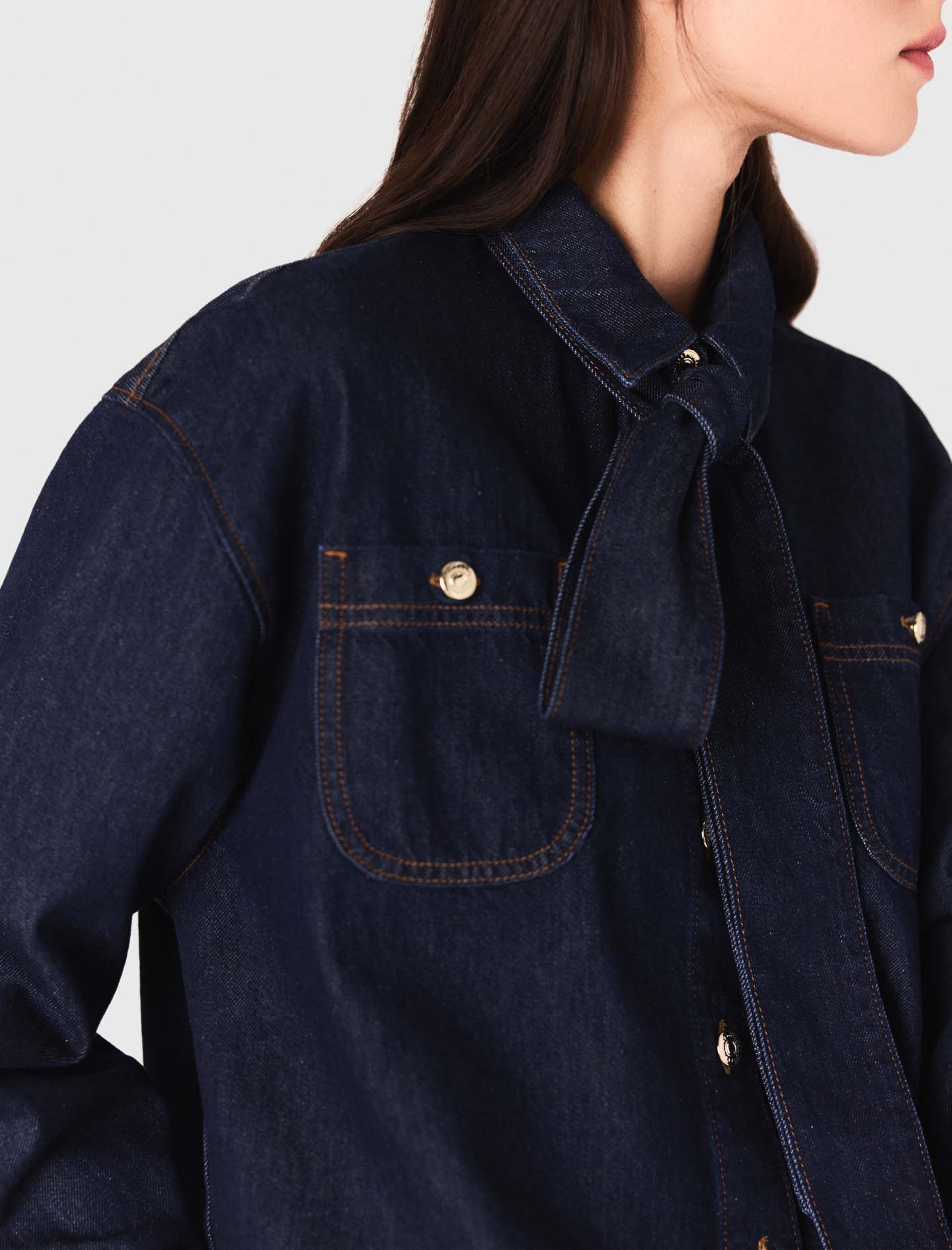 Denim shirt with pussy bow
