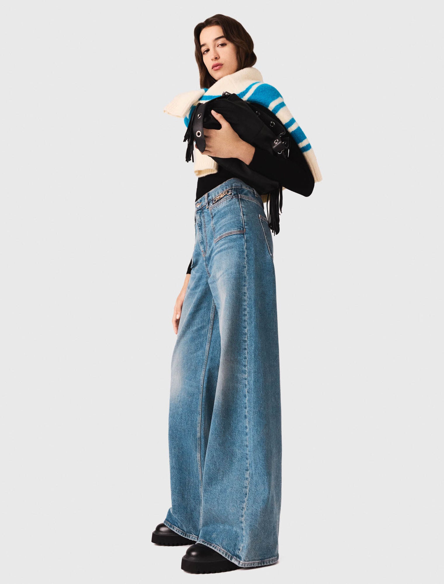 Flared jeans with chain