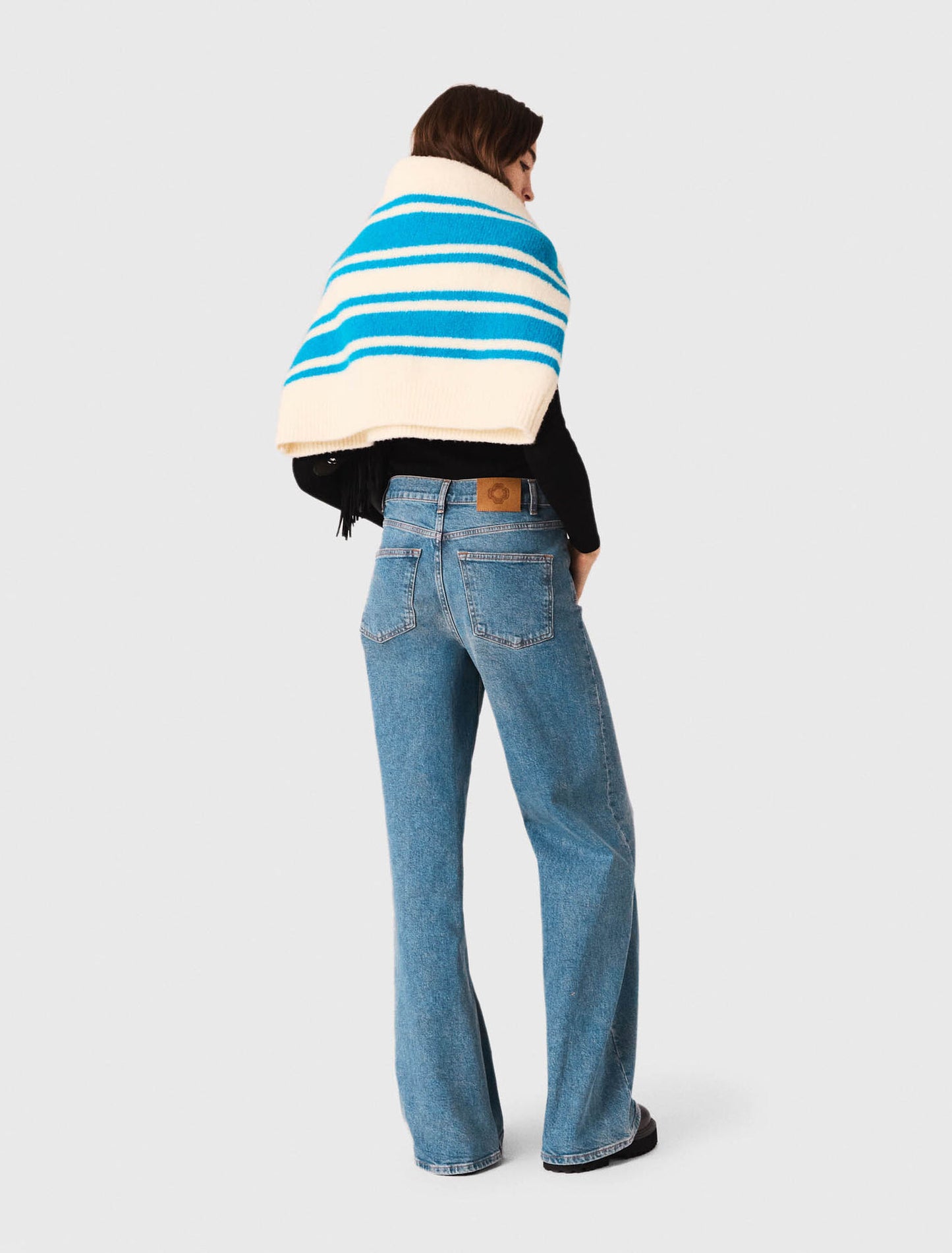 Flared jeans with chain