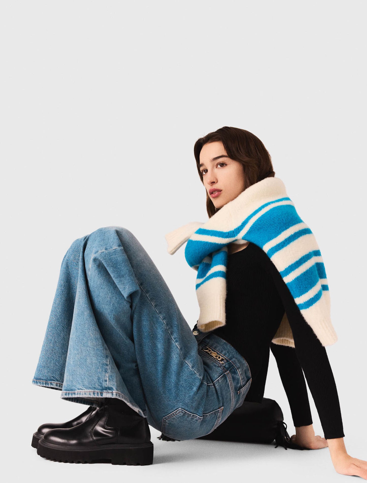 Flared jeans with chain