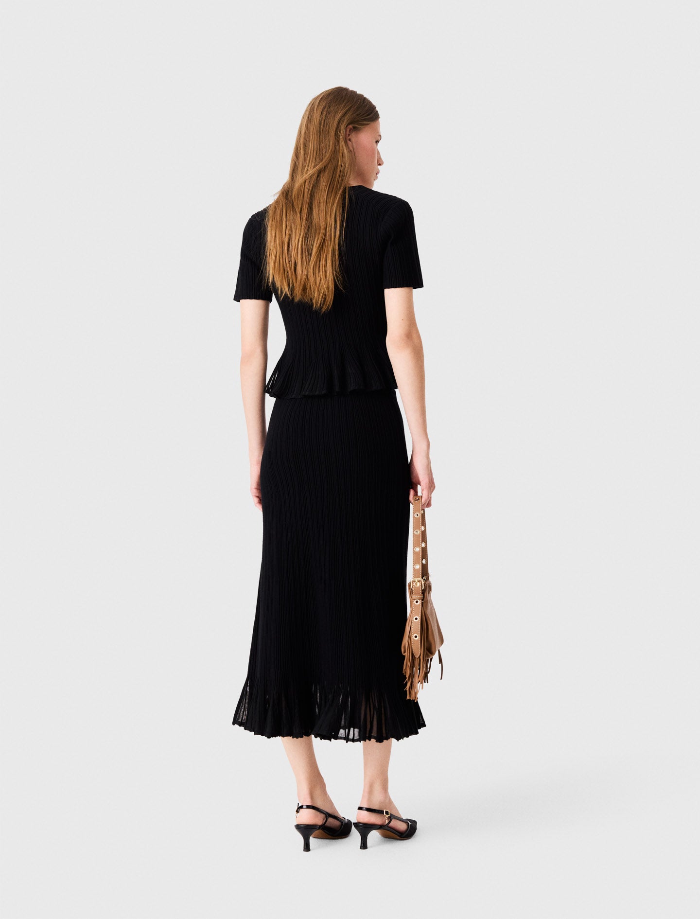 Knit skirt with peplum hem Black