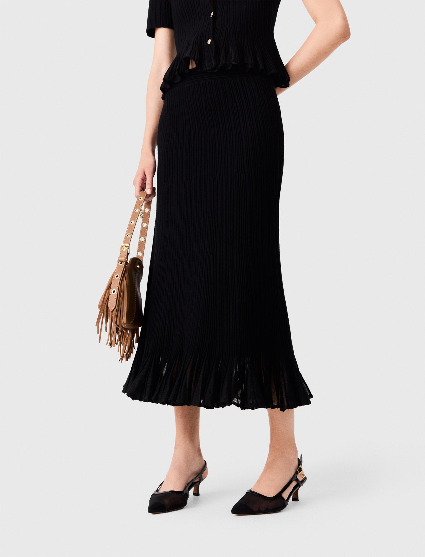 Knit skirt with peplum hem Black