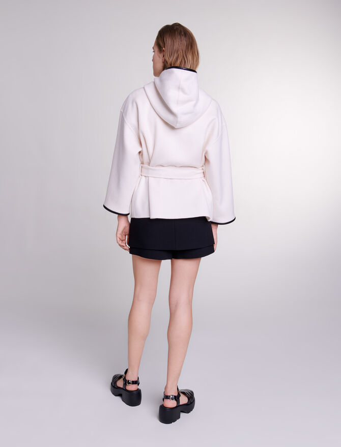 White-Cape-style wool coat
