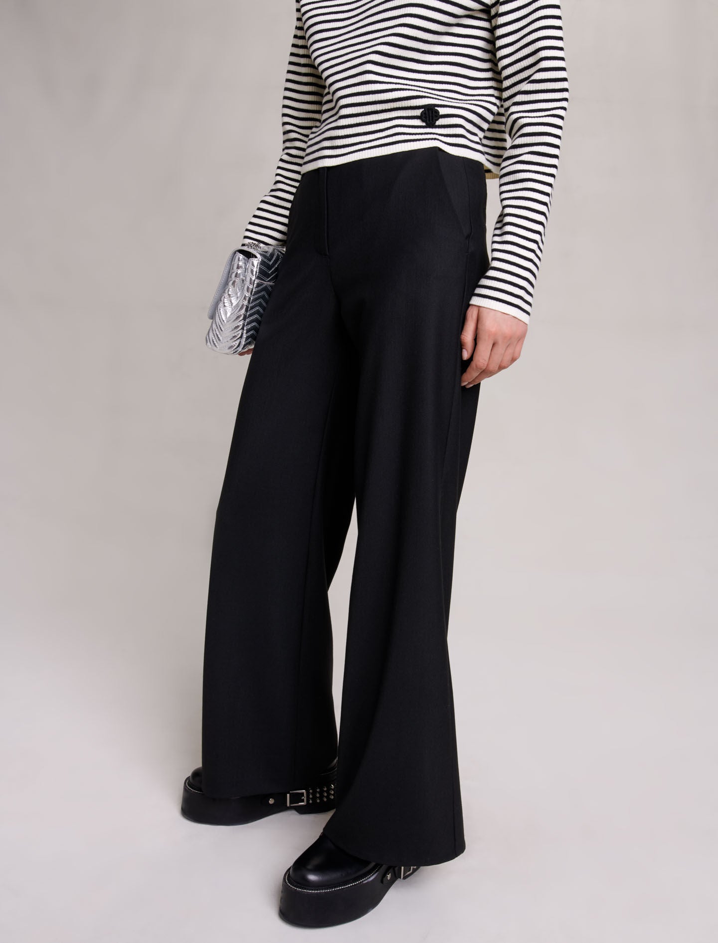 Black-flared trousers