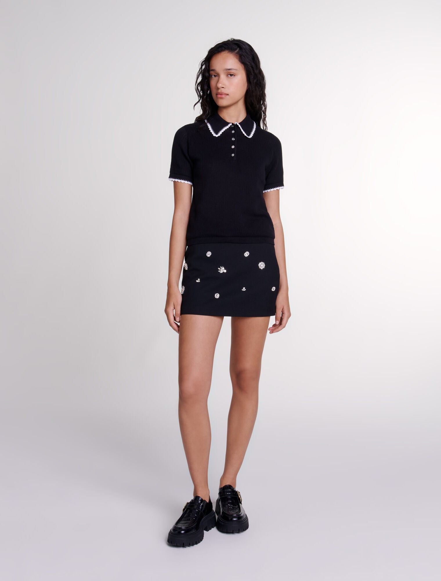 Black featured-Pointelle knit polo shirt