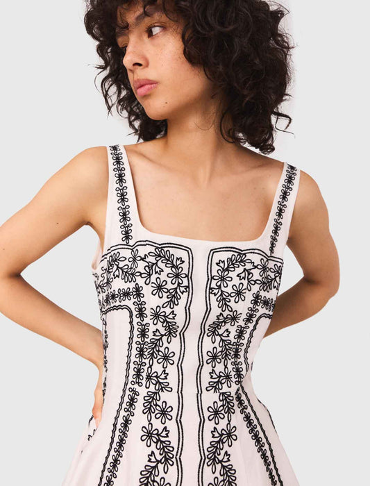 Short embroidered dress with straps
