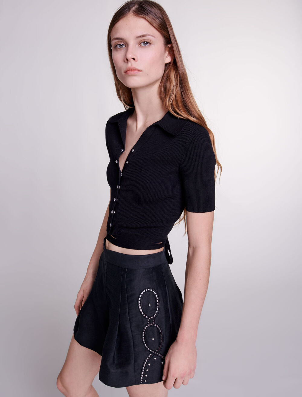 Black-featured-Openwork linen shorts with rivets