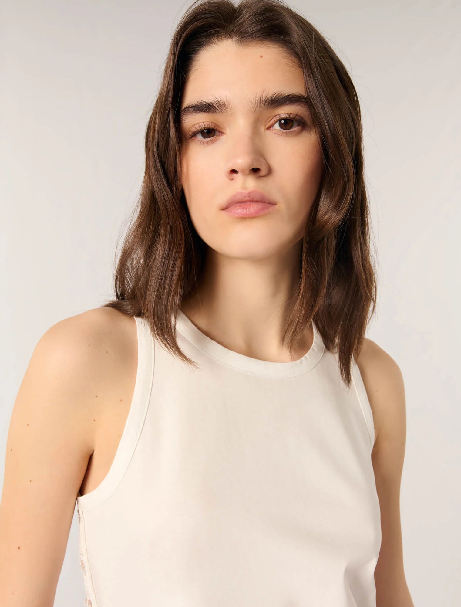 White-Vest top with crochet back